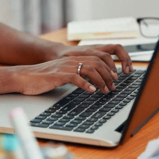 Image of person using a laptop